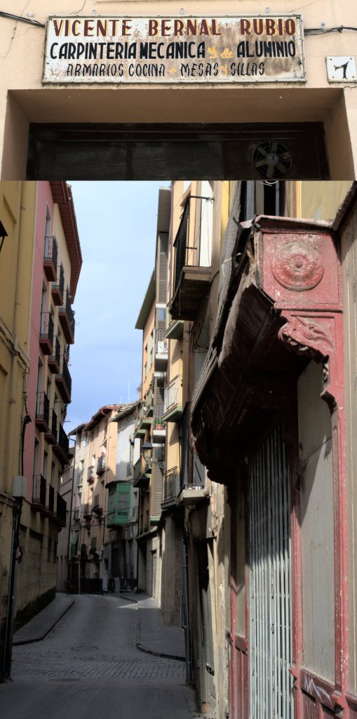 Un cartel antiguo y una calle de Calatayud.